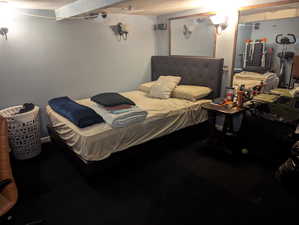 Bedroom with a textured wall