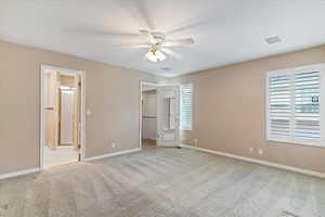 Primary Bedroom with Walk in closet and Primary bathroom ensuite