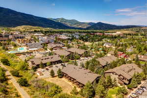 Aerial view of residential area with a mountainous background