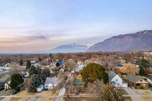 View of mountain backdrop with nearby suburban area