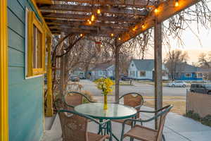 View of patio featuring a residential view and outdoor dining space