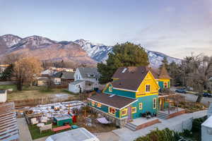 Aerial view of residential area featuring a mountainous background