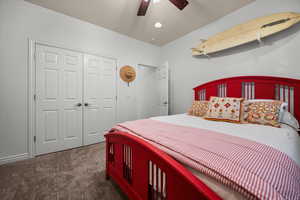Bedroom featuring dark colored carpet, recessed lighting, a closet, and ceiling fan