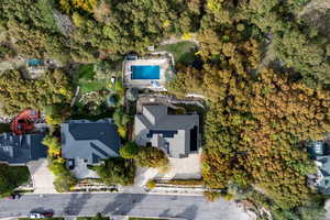 Aerial overview of property's location with a pool area