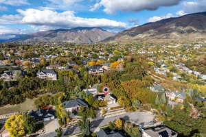 Aerial view of property's location featuring nearby suburban area