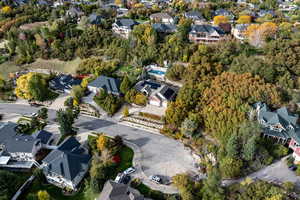 Aerial view of property's location featuring nearby suburban area