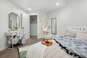 Bedroom featuring carpet and recessed lighting