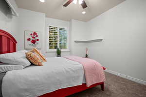 Bedroom with carpet flooring, a ceiling fan, and recessed lighting
