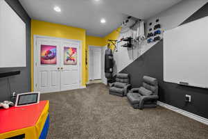 Rec room featuring carpet floors and recessed lighting