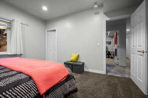 Bedroom with recessed lighting and carpet flooring