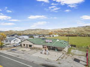Aerial view of residential area with a mountain backdrop