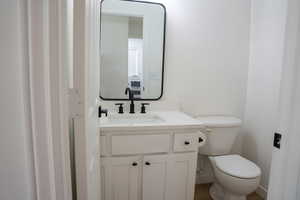 Bathroom with vanity and toilet