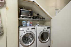 Laundry room with washer and dryer