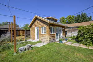 View of outbuilding with french doors