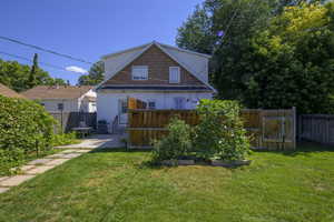 Back of house featuring a fenced backyard and a patio area