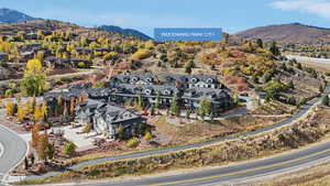 Aerial view of residential area featuring a mountain backdrop