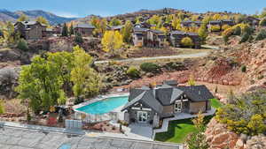 Drone / aerial view of a pool and mountains