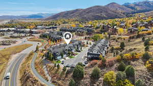 Aerial view of residential area with a mountain backdrop