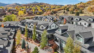 Aerial view of residential area with a mountain backdrop