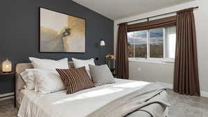 Virtually staged. Bedroom with light colored carpet and baseboards