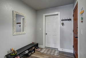 Foyer entrance as well as access to attached garage