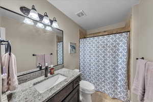 Full bath featuring vanity and a stall shower