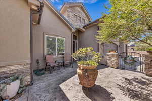 View of patio / terrace featuring a gate