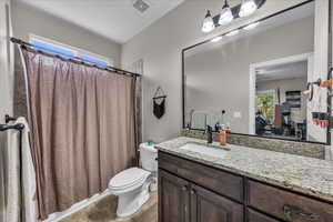 Bathroom featuring vanity and light tile patterned floors
