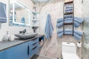 Beautifully remodeled primary bathroom with heated floors.