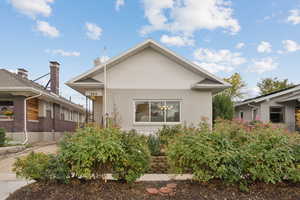 View of front facade featuring brick siding