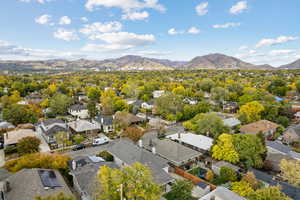 Aerial perspective of suburban area with a mountain backdrop