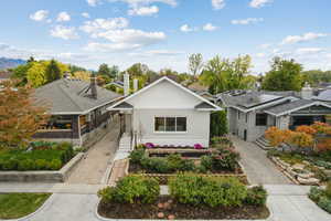 View of front facade featuring brick siding and a residential view