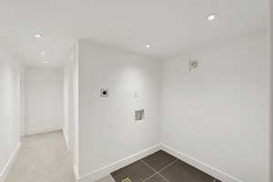 Laundry room featuring tile patterned floors, recessed lighting, washer hookup, electric dryer hookup, and carpet floors