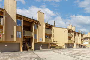 View the unit with a garage