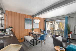 Sleek decor and accent wall in dining space
