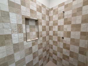 Bathroom with tiled shower