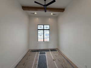 Spare room featuring beamed ceiling, ceiling fan, and recessed lighting