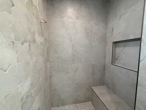 Bathroom with a tile shower
