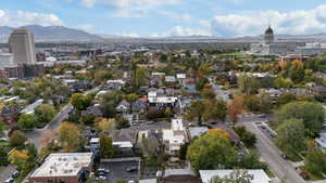 Aerial view of residential area featuring mountains