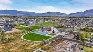 Aerial view of residential area with a mountain backdrop