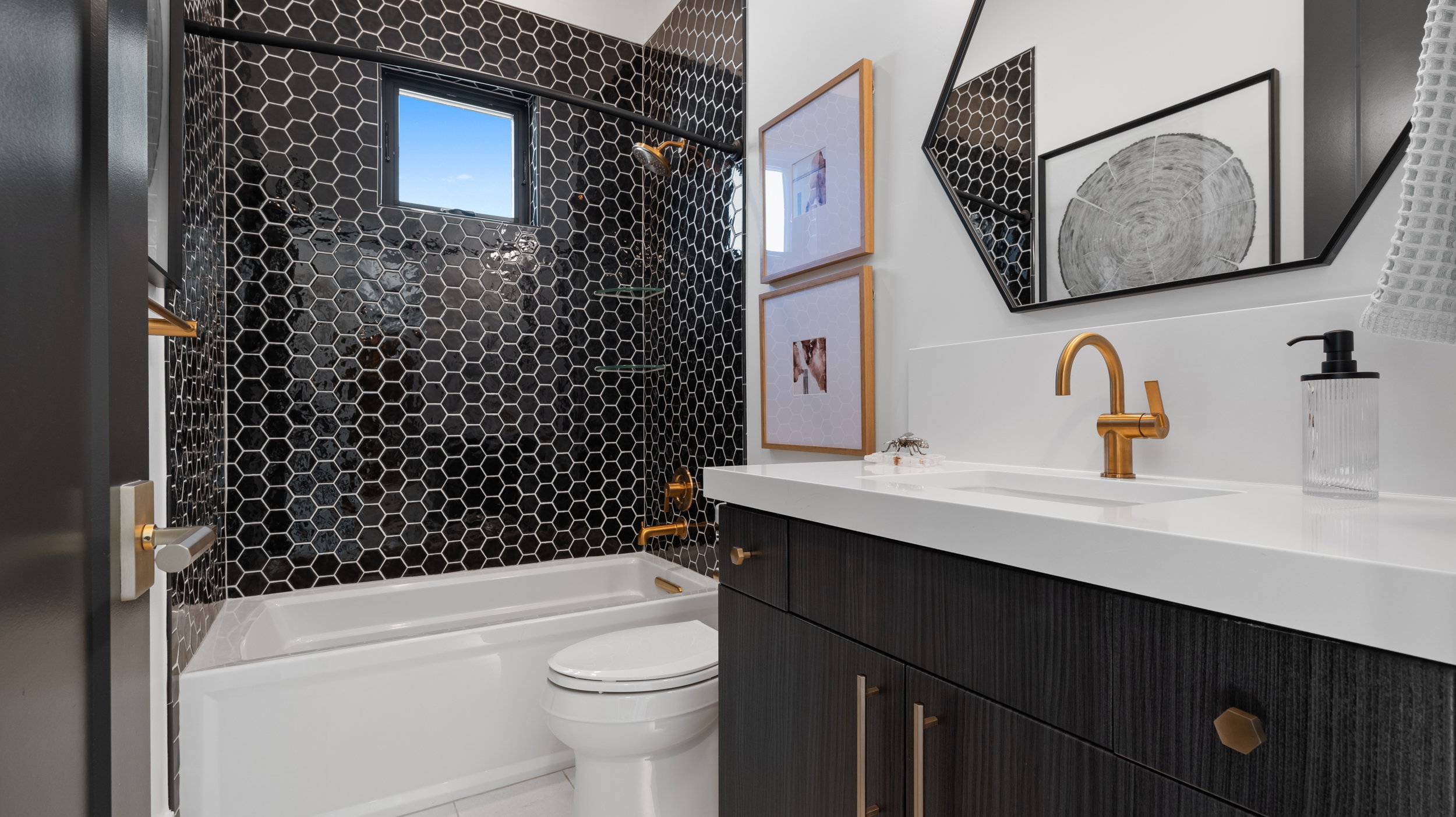 Bathroom featuring vanity and tub / shower combination