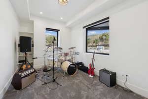Game room featuring dark carpet and recessed lighting