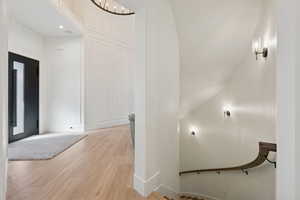 Foyer entrance featuring light wood-type flooring and baseboards