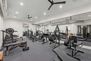 Exercise room featuring recessed lighting