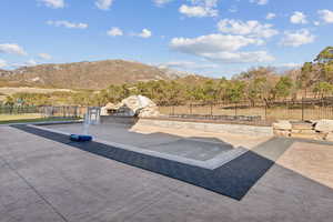 View of patio / terrace with a mountain view