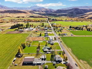 Aerial view of sparsely populated area featuring a mountain backdrop