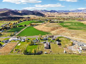 Overview of rural landscape with a mountain backdrop