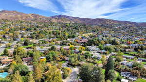 View of property location with nearby suburban area