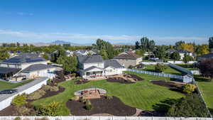 Aerial view of residential area featuring a mountain backdrop