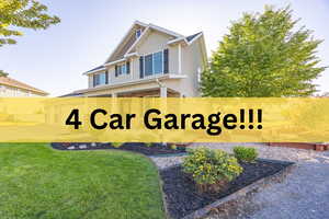 Community / neighborhood sign featuring a lawn